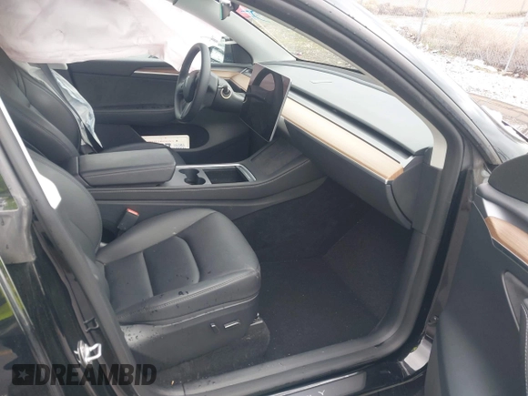 2023 Tesla Model Y Long Range with VIN 7SAYGDEE5PF766685, listed as a IAAI auction lot 41933729 with 25,959 mi miles and . Bid and sale history available at DreamBid. Image 5.