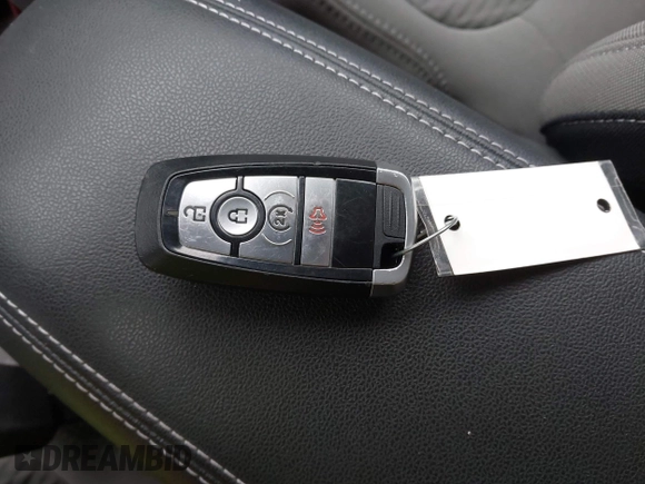 2022 Ford Escape SE z VIN 1FMCU0G62NUB32670, wystawiony jako IAAI lot #42259177 z przebiegiem 67 692 mil mil oraz . Historia ofert i sprzedaży dostępna na DreamBid. Obrazek 11.