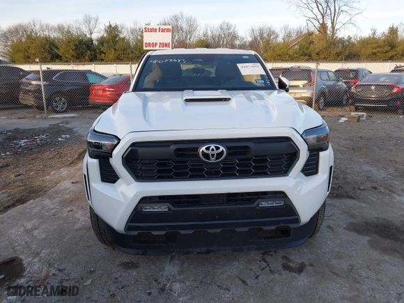 2024 Toyota Tacoma 4WD SR5 with VIN 3TMLB5JN4RM025976, listed as a IAAI auction lot 41073693 with 14,215 mi miles. Bid and sale history available at carsss.com. Image 12.