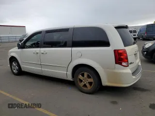 2012 Dodge Grand Caravan SXT with VIN 2C4RDGCG6CR204681, listed as a Copart auction lot 80799044 with 183,195 mi miles and Salvage Title. Bid and sale history available at DreamBid. Image 2.