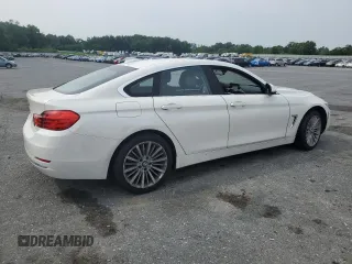 2015 BMW 4 Series 428i xDrive с VIN WBA4C9C52FD330306, выставлен на аукционе Copart как лот 60834435 с пробегом 167 034 миль миль и Списание • Salvage title. История ставок и продаж доступна на DreamBid. Изображение 3.