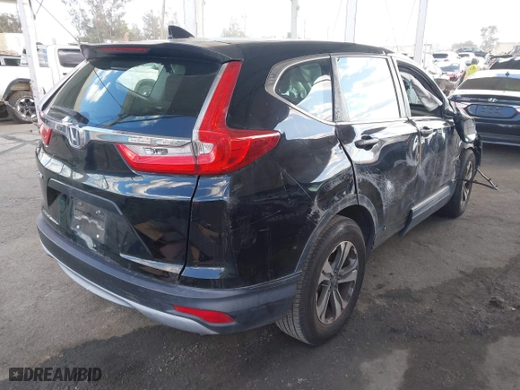 2019 Honda CR-V LX with VIN 2HKRW5H33KH406779, listed as a IAAI auction lot 41953202 with 73,039 mi miles. Bid and sale history available at carsss.com. Image 4.