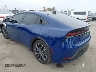 2023 Toyota Prius LE z VIN JTDACAAU8P3002445, wystawiony jako IAAI lot #42159749 z przebiegiem 18 510 mil mil oraz . Historia ofert i sprzedaży dostępna na DreamBid. Obrazek 3.