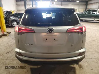 2018 Toyota RAV4 LE with VIN JTMBFREV6JJ225650, listed as a Copart auction lot 62058125 with Not provided miles and Salvage title. Bid and sale history available at DreamBid. Image 6.