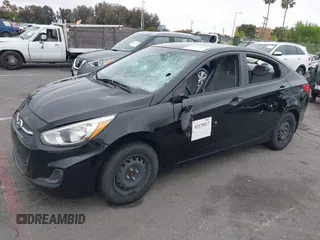 2015 Hyundai Accent GLS z VIN KMHCT4AE8FU827019, wystawiony jako IAAI lot #42179517 z przebiegiem 52 039 mil mil oraz . Historia ofert i sprzedaży dostępna na DreamBid. Obrazek 2.