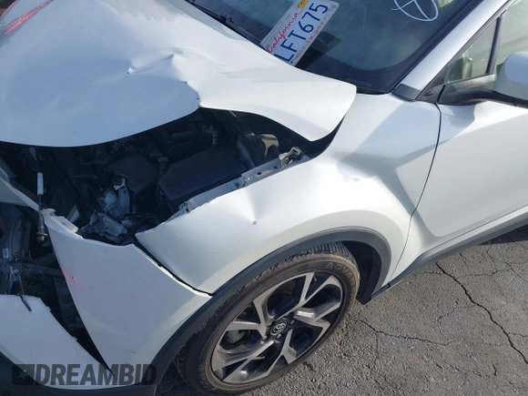 2019 Toyota C-HR XLE with VIN JTNKHMBX4K1040772, listed as a IAAI auction lot 41812031 with 79,729 mi miles. Bid and sale history available at carsss.com. Image 18.
