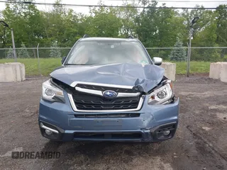 2018 Subaru Forester Touring with VIN JF2SJAWC5JH528330, listed as a IAAI auction lot 42344618 with 62,446 mi miles and . Bid and sale history available at DreamBid. Image 12.
