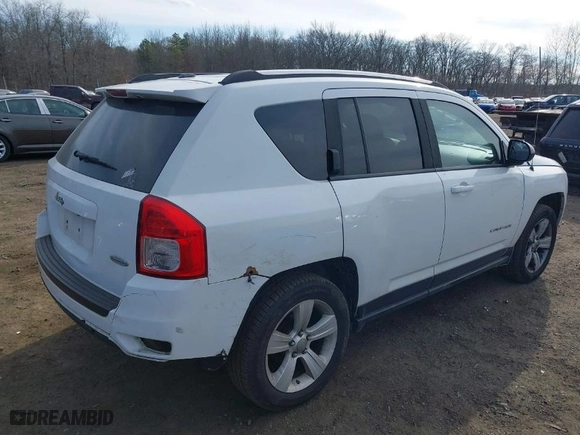 2012 Jeep Compass Latitude with VIN 1C4NJDEB5CD584509, listed as a IAAI auction lot 41672784 with 166,271 mi miles. Bid and sale history available at carsss.com. Image 6.