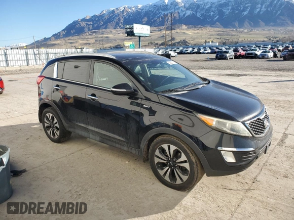 2011 Kia Sportage SX with VIN KNDPCCA66B7150506, listed as a Copart auction lot 50261715 with 199,282 mi miles and Salvage title. Bid and sale history available at DreamBid. Image 4.