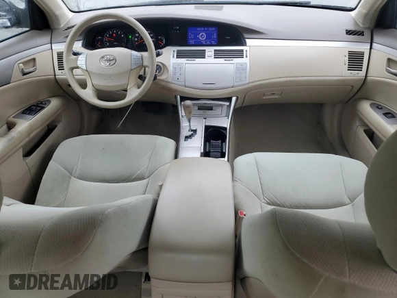 2005 Toyota Avalon XL z VIN 4T1BK36BX5U017137, wystawiony jako Copart lot #57623495 z przebiegiem 130 875 mil mil oraz Szkoda całkowita • Salvage title. Historia ofert i sprzedaży dostępna na DreamBid. Obrazek 8.