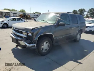 1999 Chevrolet Tahoe Z71 with VIN 1GNEK13R6XJ414699, listed as a Copart auction lot 63051505 with 141,236 mi miles and Salvage title. Bid and sale history available at DreamBid. Image 1.