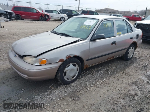 1999 Chevrolet Prizm z VIN 1Y1SK5488XZ446950, wystawiony jako IAAI lot #41798129 z przebiegiem 292 798 mil mil oraz . Historia ofert i sprzedaży dostępna na DreamBid. Obrazek 2.