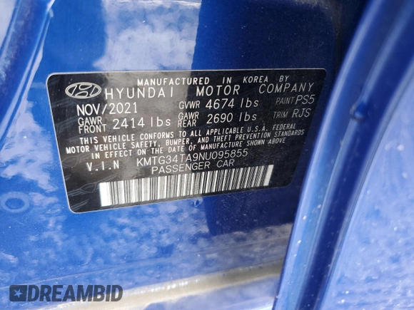 2022 Genesis G70 2.0T with VIN KMTG34TA9NU095855, listed as a Copart auction lot 86511574 with 65,619 mi miles and Salvage Title. Bid and sale history available at DreamBid. Image 12.