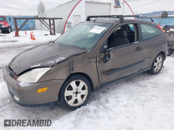 2000 Ford Focus ZX3 with VIN 3FAFP3137YR246156, listed as a IAAI auction lot 41330476 with 209,212 mi miles and . Bid and sale history available at DreamBid. Image 2.