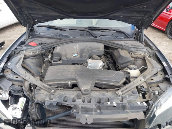 2016 BMW 2 Series 228i xDrive with VIN WBA1L9C5XGV767324, listed as a IAAI auction lot 41795604 with 133,276 mi miles. Bid and sale history available at carsss.com. Image 10.