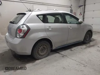 2009 Pontiac Vibe z VIN 5Y2SM67019Z416332, wystawiony jako IAAI lot #42169769 z przebiegiem 253 861 mil mil oraz . Historia ofert i sprzedaży dostępna na DreamBid. Obrazek 4.
