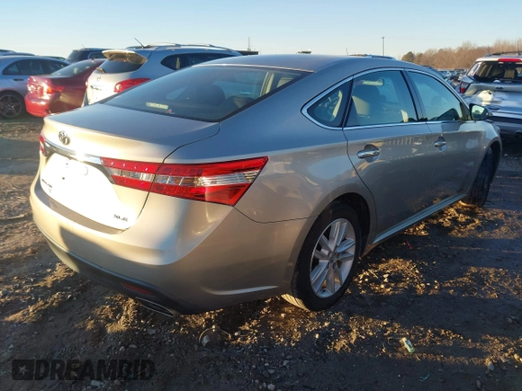 2013 Toyota Avalon XLE with VIN 4T1BK1EB2DU067941, listed as a IAAI auction lot 41321943 with 159,524 mi miles and . Bid and sale history available at DreamBid. Image 4.