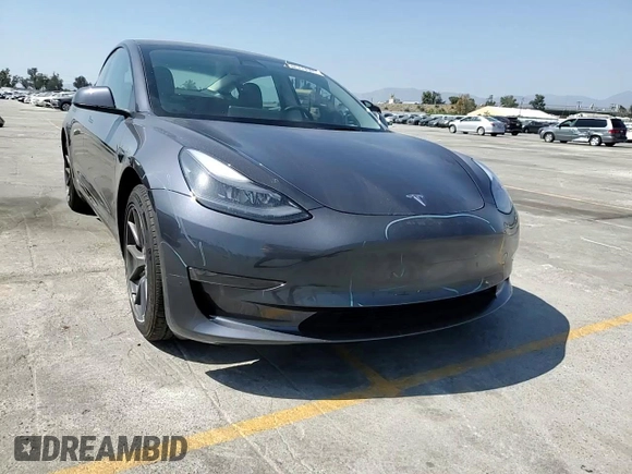 2023 Tesla Model 3 with VIN 5YJ3E1EA3PF695267, listed as a Copart auction lot 52559645 with 9,025 mi miles and Salvage title. Bid and sale history available at DreamBid. Image 14.