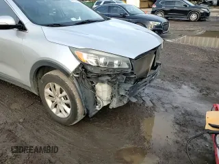 2016 Kia Sorento L with VIN 5XYPG4A30GG014611, listed as a Copart auction lot 41876985 with Not Provided miles and Salvage Title. Bid and sale history available at DreamBid. Image 12.