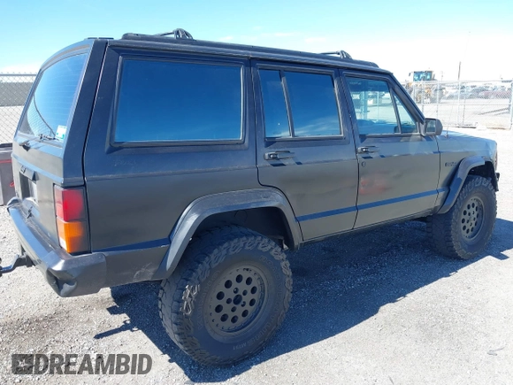 1994 Jeep Cherokee Sport with VIN 1J4FJ68S2RL175128, listed as a IAAI auction lot 41722936 with 345,700 mi miles and . Bid and sale history available at DreamBid. Image 4.