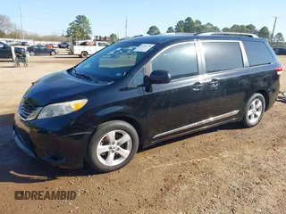 2012 Toyota Sienna LE AAS with VIN 5TDKK3DC6CS238848, listed as a IAAI auction lot 41728728 with 142,240 mi miles. Bid and sale history available at carsss.com. Image 2.