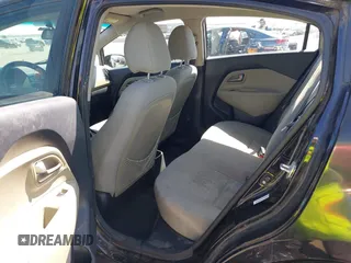 2014 Kia Rio LX with VIN KNADM4A39E6364490, listed as a IAAI auction lot 42128702 with 130,981 mi miles and . Bid and sale history available at DreamBid. Image 8.
