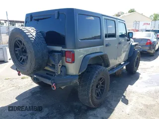 2017 Jeep Wrangler Unlimited Sahara with VIN 1C4BJWEG1HL746854, listed as a IAAI auction lot 41948127 with 97,730 mi miles. Bid and sale history available at carsss.com. Image 4.