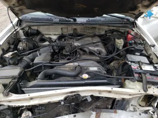1999 Toyota 4Runner Limited z VIN JT3GN87R1X0100545, wystawiony jako Copart lot #57900635 z przebiegiem 215 408 mil mil oraz Szkoda całkowita • Salvage title. Historia ofert i sprzedaży dostępna na DreamBid. Obrazek 12.