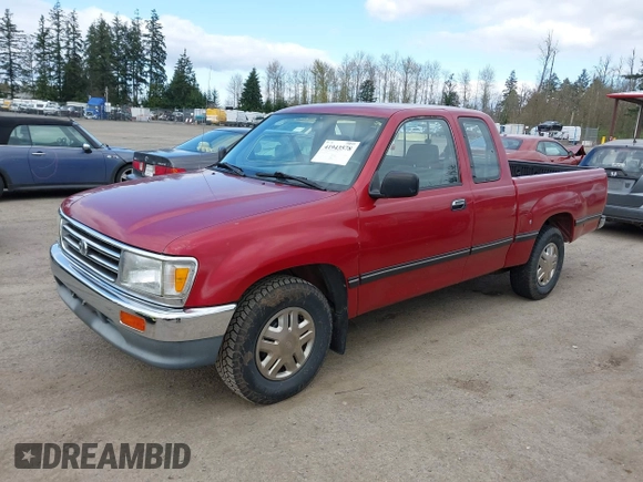 1995 Toyota T100 DX with VIN JT4VD12E6S0005957, listed as a IAAI auction lot 41943578 with 128,489 mi miles. Bid and sale history available at carsss.com. Image 2.