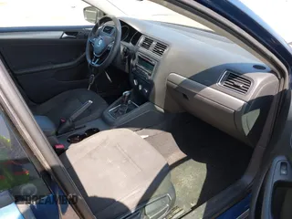 2015 Volkswagen Jetta Sedan 1.8T SE with VIN 3VWD17AJ1FM270114, listed as a IAAI auction lot 42128816 with 111,701 mi miles. Bid and sale history available at carsss.com. Image 5.