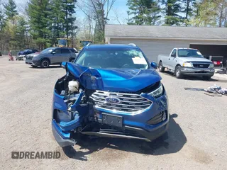 2020 Ford Edge SEL z VIN 2FMPK4J98LBA07595, wystawiony jako IAAI lot #42068572 z przebiegiem 105 352 mil mil oraz . Historia ofert i sprzedaży dostępna na DreamBid. Obrazek 13.