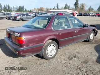 1990 Honda Accord EX with VIN JHMCB7561LC077247, listed as a IAAI auction lot 40819375 with 329,769 mi miles. Bid and sale history available at carsss.com. Image 4.