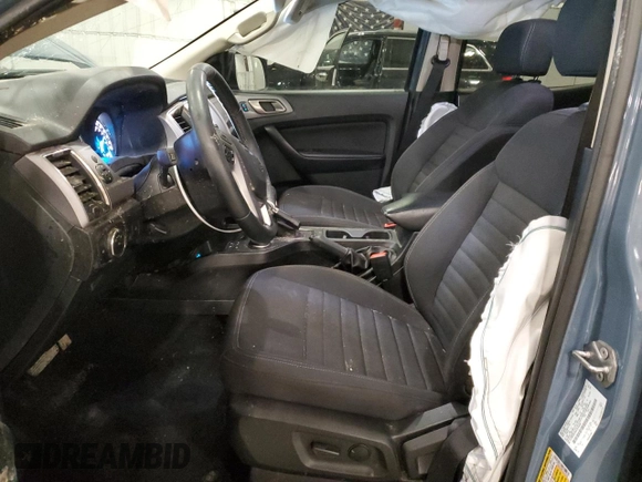 2023 Ford Ranger XL with VIN 1FTER4FH9PLE34829, listed as a Copart auction lot 55485345 with 34,046 mi miles and Salvage title. Bid and sale history available at DreamBid. Image 7.