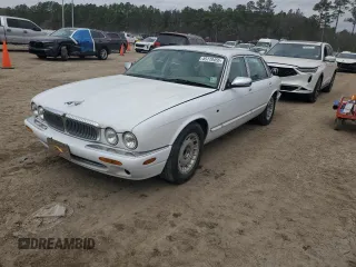 1999 Jaguar XJ z VIN SAJKX6042XC863807, wystawiony jako Copart lot #45118455 z przebiegiem 121 504 mil mil oraz Szkoda całkowita • Salvage title. Historia ofert i sprzedaży dostępna na DreamBid. Obrazek 1.