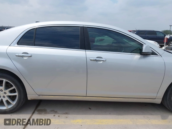 2012 Chevrolet Malibu LTZ with VIN 1G1ZG5E72CF313664, listed as a IAAI auction lot 42055669 with 97,053 mi miles and . Bid and sale history available at DreamBid. Image 13.