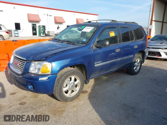 2006 GMC Envoy SLE with VIN 1GKDS13SX62315193, listed as a IAAI auction lot 41866029 with 231,164 mi miles. Bid and sale history available at carsss.com. Image 2.