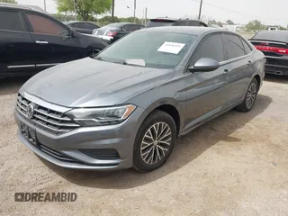 2021 Volkswagen Jetta S z VIN 3VWC57BU0MM032910, wystawiony jako IAAI lot #41836545 z przebiegiem 64 042 mil mil oraz . Historia ofert i sprzedaży dostępna na DreamBid. Obrazek 16.
