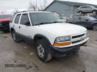 2003 Chevrolet Blazer LS z VIN 1GNDT13X63K106315, wystawiony jako IAAI lot #41914116 z przebiegiem 196 774 mil mil oraz . Historia ofert i sprzedaży dostępna na DreamBid. Obrazek 1.