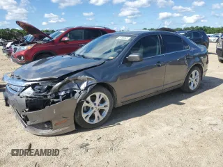 2012 Ford Fusion SE z VIN 3FAHP0HAXCR448154, wystawiony jako Copart lot #63785905 z przebiegiem 166 978 mil mil oraz Szkoda całkowita • Salvage title. Historia ofert i sprzedaży dostępna na DreamBid. Obrazek 1.