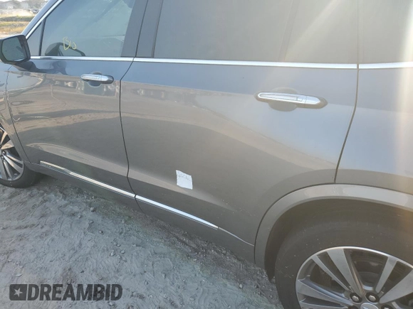 2021 Cadillac XT6 Premium Luxury with VIN 1GYKPCRS5MZ198953, listed as a Copart auction lot 67291154 with 0 mi miles and Salvage Title. Bid and sale history available at carsss.com. Image 13.