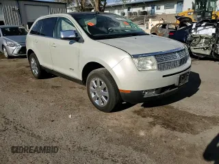 2007 Lincoln MKX z VIN 2LMDU88C07BJ26919, wystawiony jako Copart lot #55778005 z przebiegiem Nie podano mil oraz Szkoda całkowita • Salvage title. Historia ofert i sprzedaży dostępna na DreamBid. Obrazek 13.