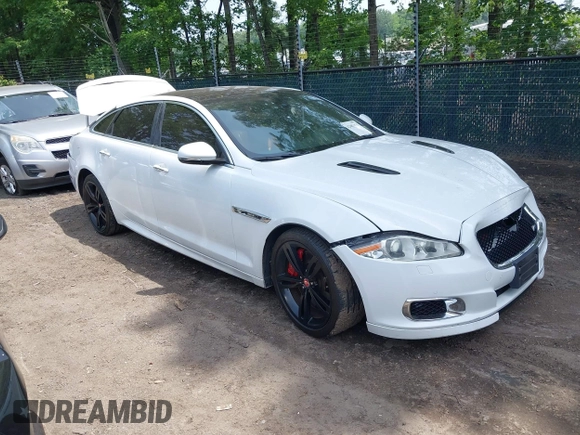 2014 Jaguar XJ with VIN SAJWA2EK8EMV67443, listed as a IAAI auction lot 42483075 with 88,357 mi miles and . Bid and sale history available at DreamBid. Image 1.