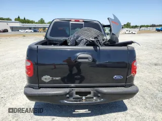 2001 Ford F-150 XLT with VIN 1FTRW07LX1KB47311, listed as a Copart auction lot 58848395 with Not provided miles and Salvage title. Bid and sale history available at DreamBid. Image 6.