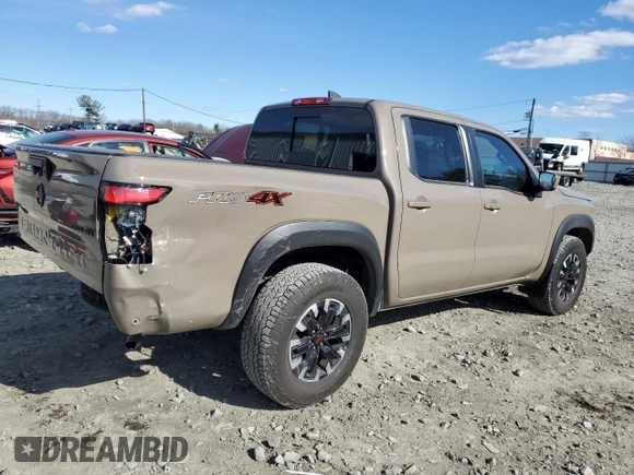 2024 Nissan Frontier Pro-4X with VIN 1N6ED1EK2RN656885, listed as a Copart auction lot 46604165 with 4,390 mi miles and Salvage title. Bid and sale history available at DreamBid. Image 3.