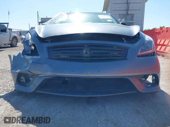 2014 Infiniti Q60 Journey z VIN JN1CV6EK1EM110800, wystawiony jako IAAI lot #41793724 z przebiegiem 134 408 mil mil oraz . Historia ofert i sprzedaży dostępna na DreamBid. Obrazek 19.