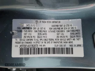 2012 Mazda CX-9 Touring z VIN JM3TB3CV8C0352576, wystawiony jako Copart lot #57489975 z przebiegiem 141 801 mil mil oraz Szkody całkowita. Historia ofert i sprzedaży dostępna na DreamBid. Obrazek 13.