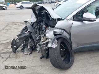 2018 Toyota C-HR XLE with VIN NMTKHMBX4JR023586, listed as a IAAI auction lot 41890863 with 86,958 mi miles and . Bid and sale history available at DreamBid. Image 6.