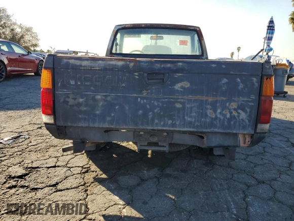 1991 Nissan Frontier z VIN 1N6SD11S2MC350332, wystawiony jako Copart lot #87462534 z przebiegiem 350 692 mil mil oraz Szkoda całkowita • Salvage title. Historia ofert i sprzedaży dostępna na DreamBid. Obrazek 10.