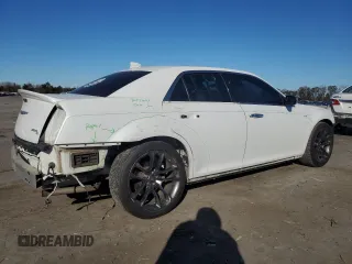 2015 Chrysler 300 C with VIN 2C3CCAET9FH922210, listed as a Copart auction lot 80310864 with 118,931 mi miles and Salvage Title. Bid and sale history available at DreamBid. Image 3.