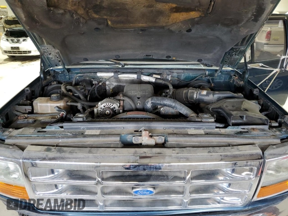 1995 Ford F-350 z VIN 1FTJW35F6SEA60338, wystawiony jako Copart lot #50962515 z przebiegiem 235 177 mil mil oraz Szkoda całkowita • Salvage title. Historia ofert i sprzedaży dostępna na DreamBid. Obrazek 11.